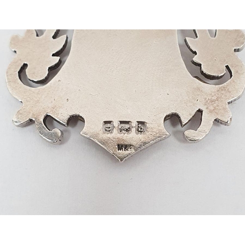 385 - Silver pendant, cartouche-shaped, embossed 'Britannia' and the silver chain link necklace