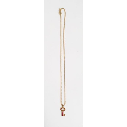 388 - Theo Fennell 18K gold and ruby miniature key-pattern pendant and the herringbone-pattern flexible ch... 
