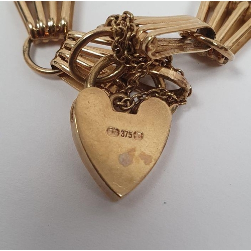 395 - 9ct gold chain-link bracelet with padlock clasp, 11.5g approx.