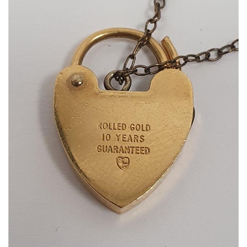 401 - 9ct gold bronze core bangle, a rolled gold chain bracelet with padlock clasp, a 9ct gold and metal f... 