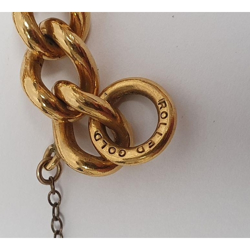 401 - 9ct gold bronze core bangle, a rolled gold chain bracelet with padlock clasp, a 9ct gold and metal f... 