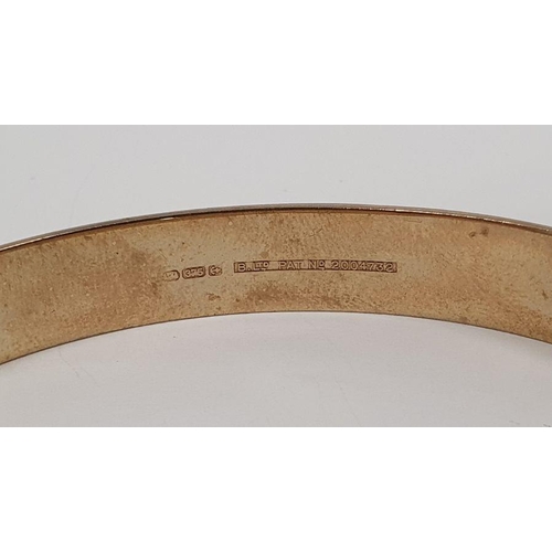 404 - 9ct gold bangle with engraved decoration, inscribed to the inside 'Today and Forever Love Danny 1999... 