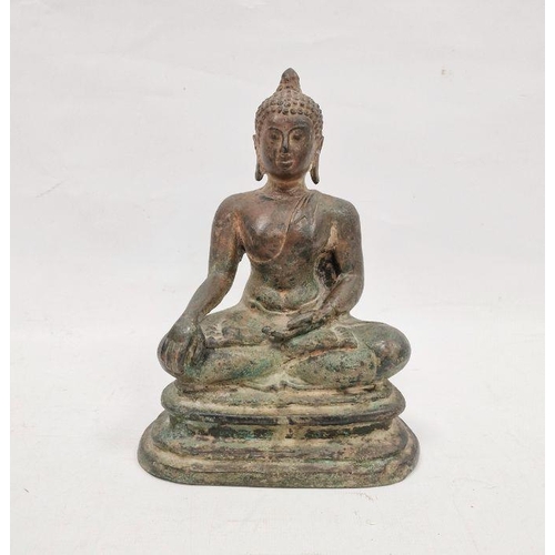 75 - Bronze figure of seated Buddha, on stepped base, 20cm high