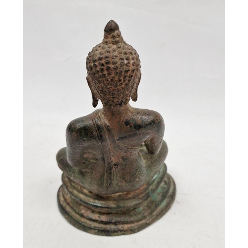 75 - Bronze figure of seated Buddha, on stepped base, 20cm high