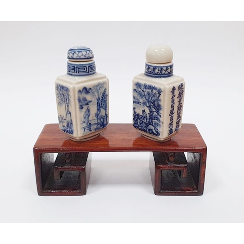 78A - Two Chinese snuff bottles with wooden stand