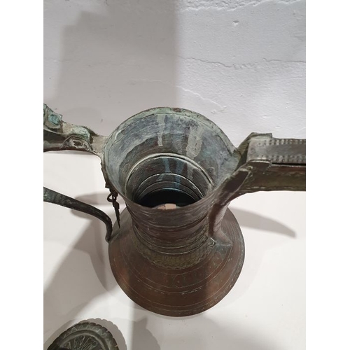 40 - Late 19th century Dallah coffee pot (damaged), assorted Middle Eastern metal pieces and three small ... 