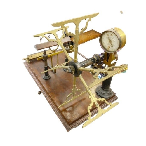 191 - A Victorian brass yarn winder on wooden stand by John Nesbitt Ltd, 42 Market Street Manchester, 68cm... 