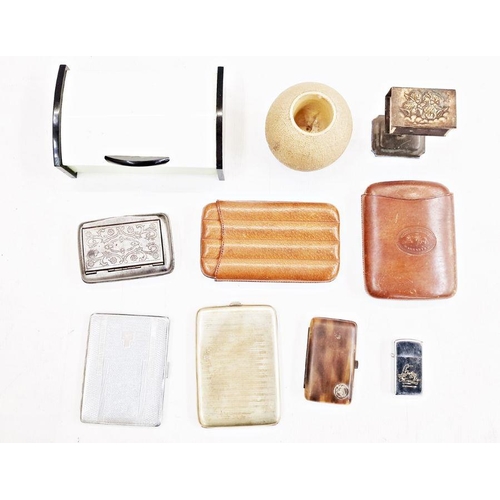 214 - Smoking paraphernalia to include leather cigar holder, matchbox, holding strikes, tobacco boxes, cig... 