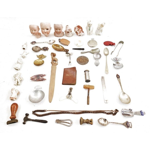 215 - Quantity of mixed collectables to include dolls heads, rulers, caddy spoons, weights, seals, etc (1 ... 