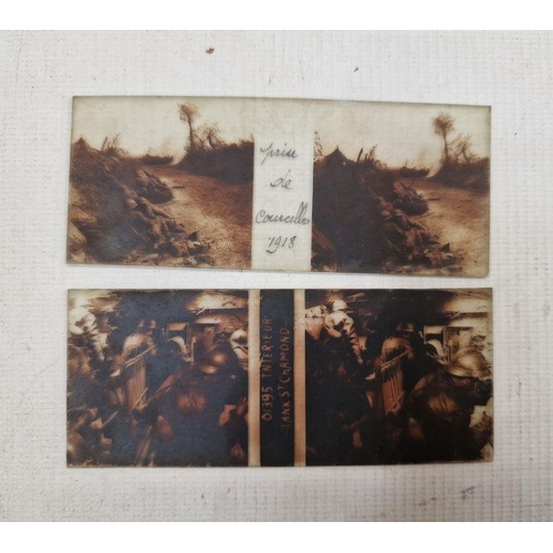 231 - A stereoscope with approximately forty-six glass slides depicting various WW1 trench and wartime sce... 