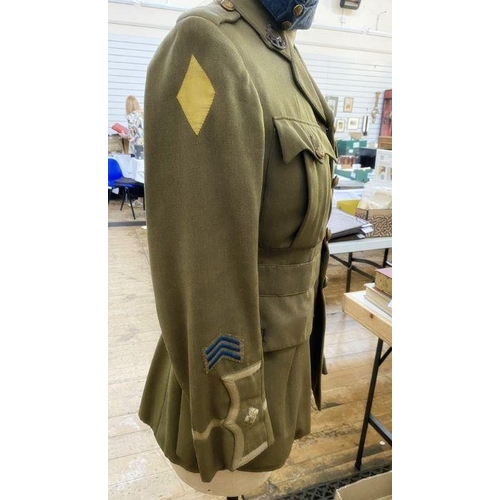 291 - WWI uniform jacket to an officer in the Royal Sussex Regiment, RAF cap with badge