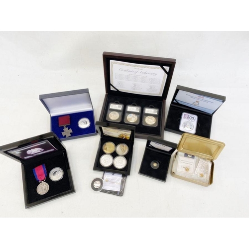 345 - Collection of miniature gold coins (3) Replica Waterloo medal and silver coin, replica Victoria Cros... 