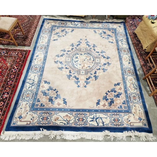 1043 - Large cream ground Chinese superwash carpet with centralised floral medallion enclosed by floral pat... 