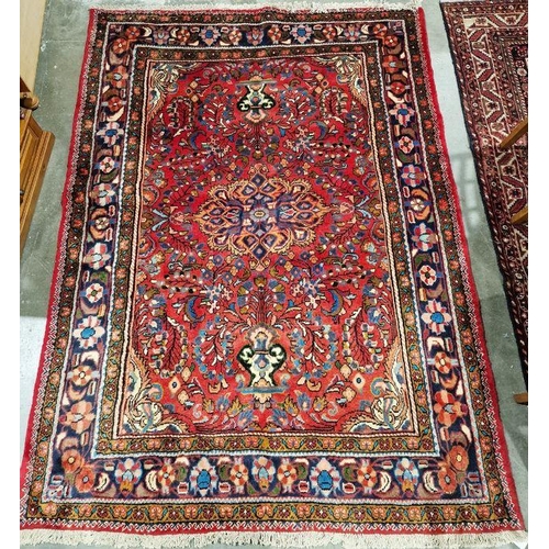 1044 - North West Persian Mahal red ground rug with central flowerhead medallion surrounded by floral spray... 