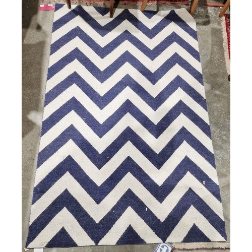 1045 - Modern Johnathan Adler Peruvian Llama wool rug with blue and white chevron design rug, 182cm X 120cm