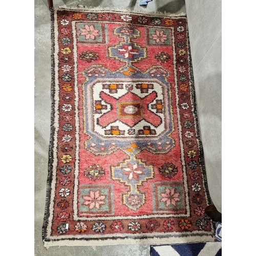 1046 - Modern Eastern style cream ground rug with one row of seven elephant foot guls to multiple geometric... 