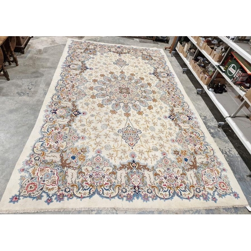 1058 - Central Persian Kashan cream ground carpet with large central floral medallion enclosed by hanging b... 