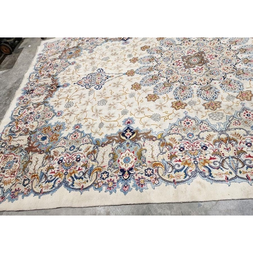 1058 - Central Persian Kashan cream ground carpet with large central floral medallion enclosed by hanging b... 