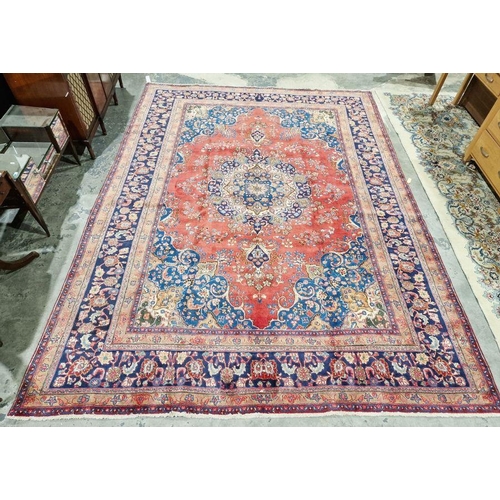 1059 - North West Persian Birjand red ground carpet with central floral medallion enclosed by floral patter... 