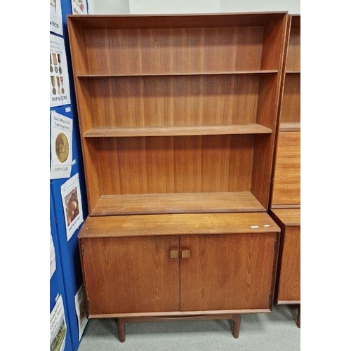 1084 - Mid century teak G-plan display cabinet designed by Kofod Larsen with two shelves  above two door cu... 