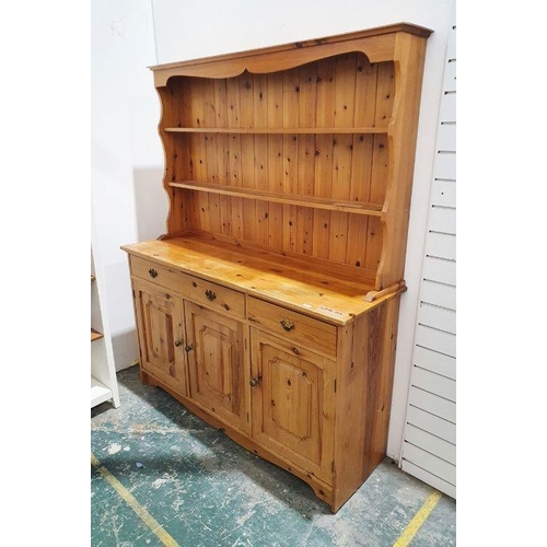 1088 - 20th century pine dresser of two shelves over rectangular base, three short drawers over three cupbo... 