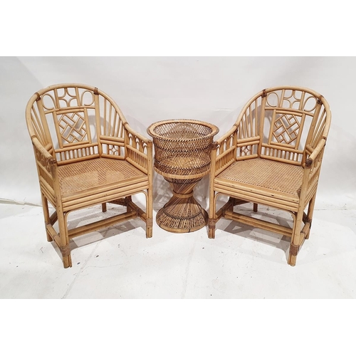 1102 - Four modern bamboo cane seated armchairs together with a similar cane table base