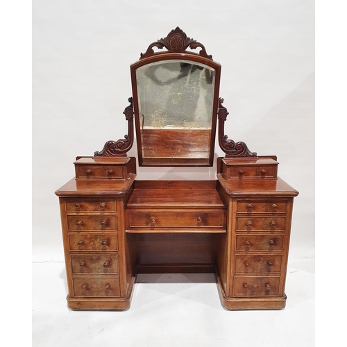 1139 - Victorian mahogany dressing table centred by a rectangular bevelled edged mirror, within carved foli... 