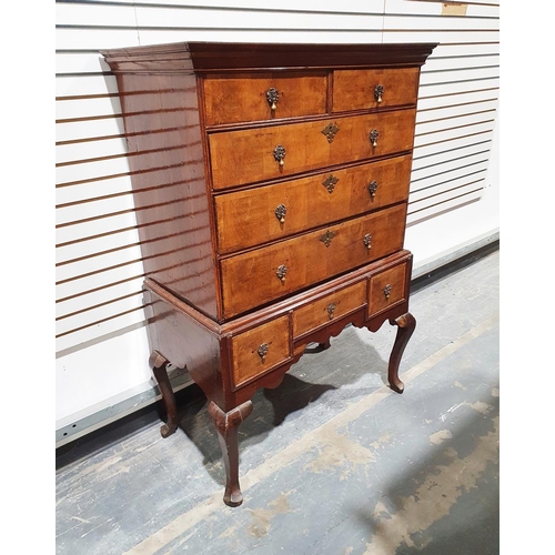 1147 - Georgian walnut chest on stand with moulded cornice above two short drawers and three long graduated... 