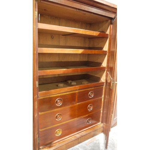 1151 - Victorian mahogany compactum with moulded cornice above three doors centred by a mirror, flanked by ... 