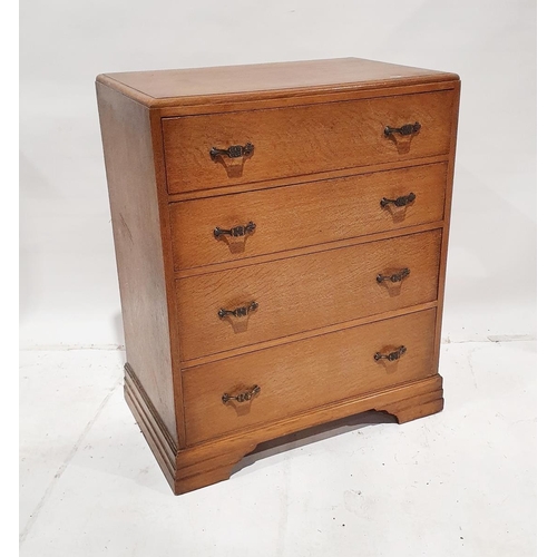 1182 - Early to mid 20th century limed oak chest of drawers, with four long graduated drawers, on bracket f... 