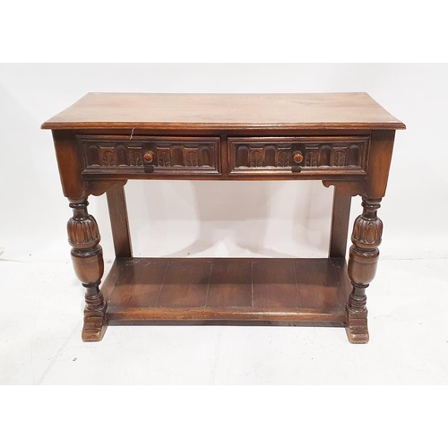 1195 - 20th century carved stained oak side table in the Elizabethan-style, with two frieze drawers carved ... 