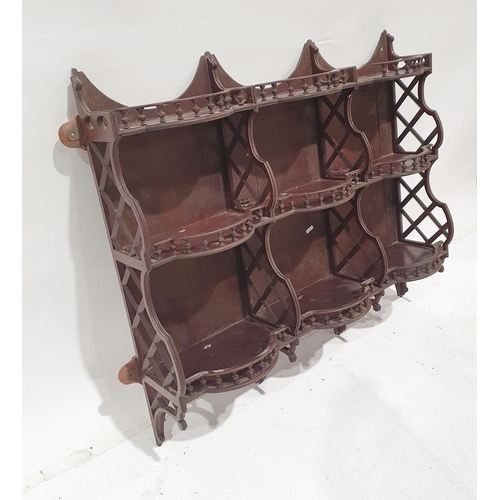 1204 - Victorian mahogany three-tier partitioned waterfall shelving unit with bowfronted galleried shelves,... 