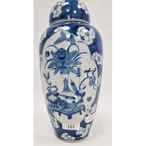 121 - Chinese lidded vase, the body of slight tapering form, blue and white set with panels featuring vase... 