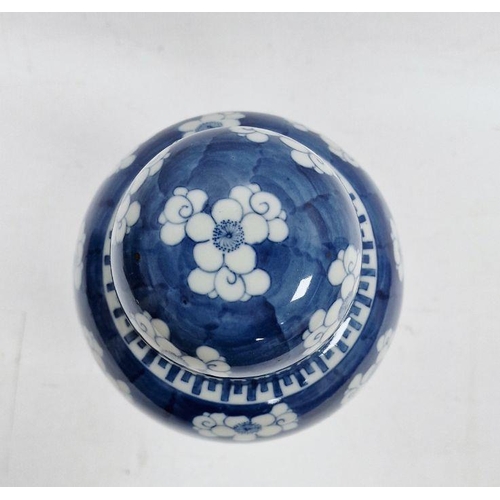 121 - Chinese lidded vase, the body of slight tapering form, blue and white set with panels featuring vase... 