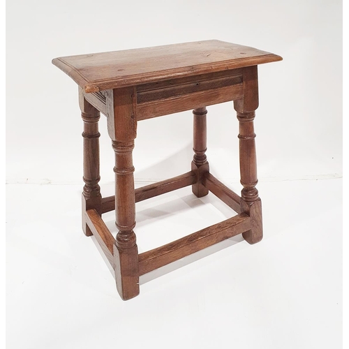 1216 - Oak joint stool with moulded edge and incised moulded frieze raised on angled turned legs with stret... 