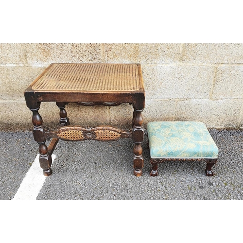 1219 - 19th century stained oak stool with cane top, on turned and stretchered legs and a 19th century carv... 