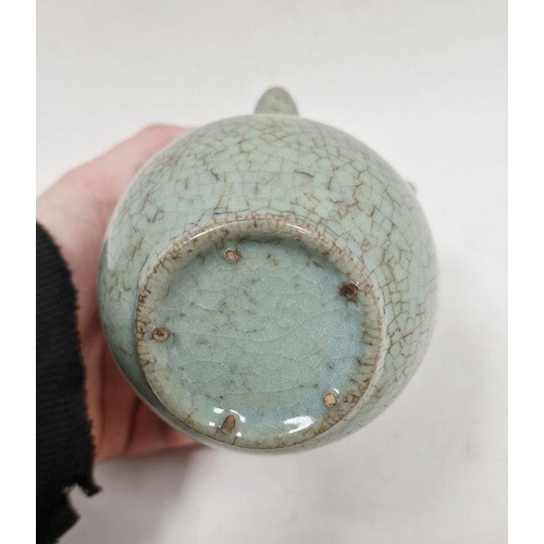 122 - 20th century Chinese flower stem vase in a pale ground celadon crackle glaze, the central stem surro... 