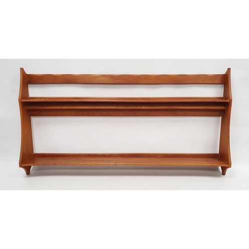 1345 - 1970 Oliver Morel Cotswold School cherrywood wall rack, the top rail with scalloped edge, two plater... 