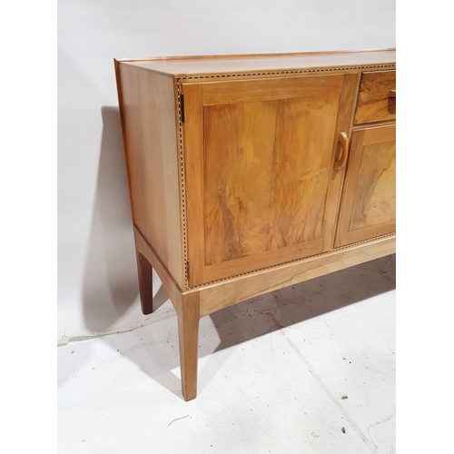 1346 - 1969/70 Oliver Morel Cotswold School walnut sideboard having slight raised edge to the back, central... 