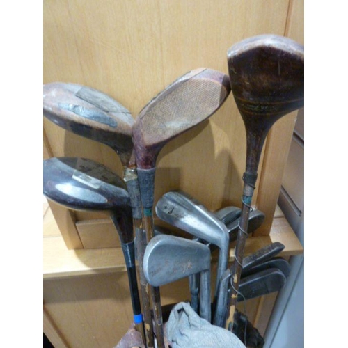 196 - Assorted antique golf clubs in case