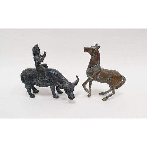 202 - Metal model of a figure riding an ox together with a metal model of a horse (2)