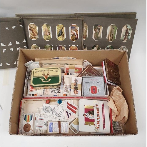 207 - Ephemera to include cigarette cards, a tray of assorted British and foreign coinage and wristwatches... 