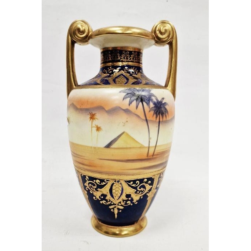 23 - Noritake two-handled vase, 20th century, printed blue marks, painted with Egyptian pyramids and a fi... 