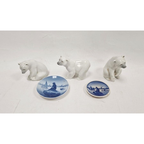 37 - Three Lladro models of polar bears, two modelled seated and the third standing, smallest 10cm high, ... 