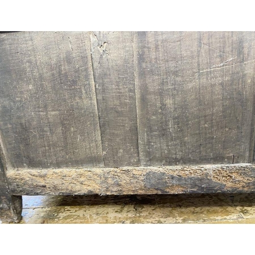 1073 - Large antique oak coffer having quadrant mould edge, scroll carved frieze, triple framed panel front... 