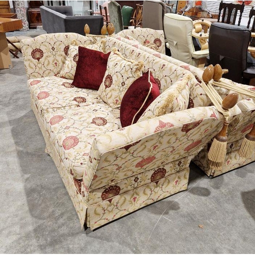 1208 - Knole drop-end sofa by Brights of Nettlebed, upholstered in a floral scrolling fabric on a cream gro... 