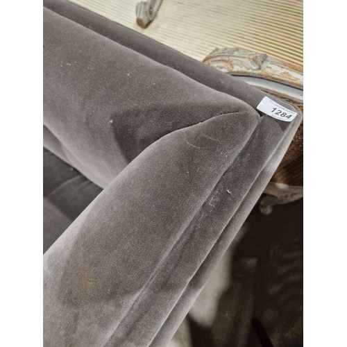 1215 - Contemporary three seat velvet upholstered sofa, grey in colour, raised upon turned feet, 74cm high ... 