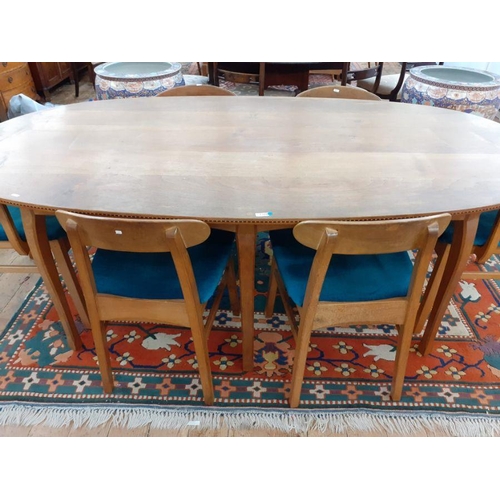 1236 - 1969/1970 Oliver Morel Cotswold School walnut oval dining table and chairs, the table having figured... 