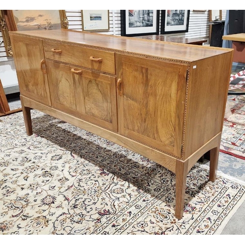 1237 - 1969/70 Oliver Morel Cotswold School walnut sideboard having slight raised edge to the back, central... 