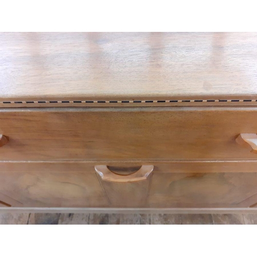 1237 - 1969/70 Oliver Morel Cotswold School walnut sideboard having slight raised edge to the back, central... 